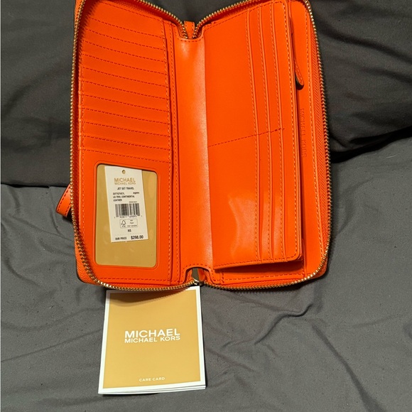 MICHAEL KORS JST 
Leather Continental Wristlet Phone Case Wallet 
Poppy 
NWT - Picture 2 of 2